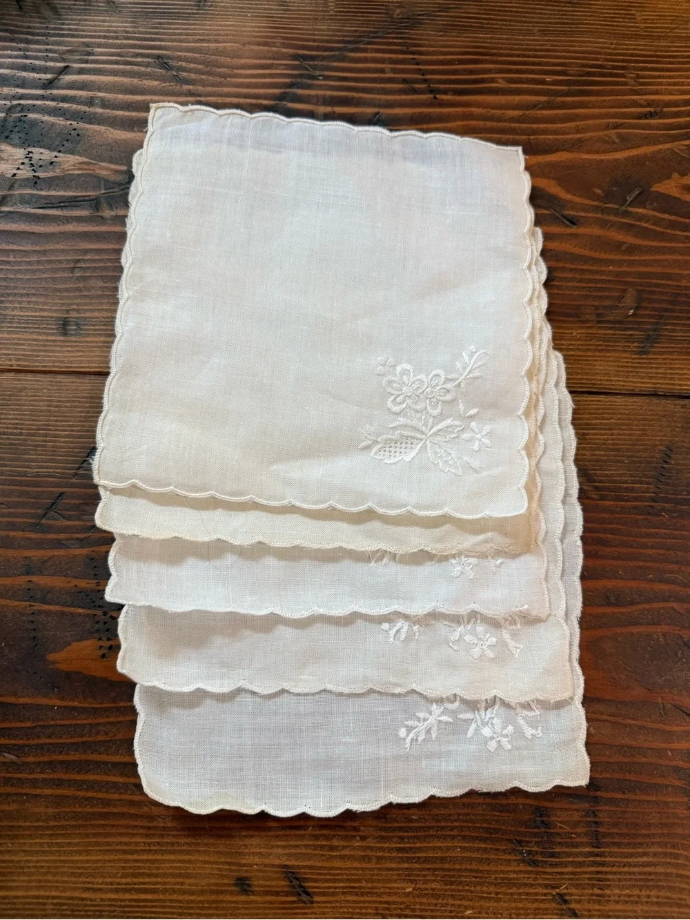 This is a set of vintage white linen cocktail napkins